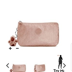 NWT Kipling large clutch metallic platinum color